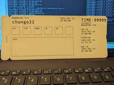 It's an ATB2 Type 4 coupon with no pre-printing and no magstripe
sitting on a laptop with the a portion of the screen and part of the
keyboard, just the number and function keys. And if you didn't know,
the ATB2 thing is the formal designation for the size and shape of
an airline boarding pass or ticket or whole host of other document 
types that airlines used to issue before the e-ticketing mandate
of 2008. 

The card itself is being used as a server update checklist and carries
boxes for all the various steps I have for server updates, the name
of the customer, the server name, the time the updates should start,
the time they should end, and a formal drop-dead time to fall back
if something goes wrong. There's even a big box for any notes and
of course the JIRA ticket number is there, because everyone likes
to get paid.

The white balance is way off because this was shot on a cell phone.
